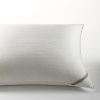 Calvin Klein's Almost Down™ pillow features a microfiber fill and 300-thread count cotton cover with an exclusive dobby pattern.