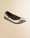 Shiny metallic faux leather, glamorously adorned with chunky rhinestones on the toe.Faux leather upperContrast elastic edgingMicrosuede liningPadded insoleRubber composite soleImported