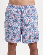 A colorful addition to a day on the beach or boat, designed with waves and palm trees in easy-fitting nylon. Elastic waist with internal drawstring Side slash, back patch pockets Meshing lining Inseam, about 7 Polyester Machine wash Imported 