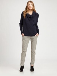 Dropped shoulders and a deep cowlneck shape this ultra-fine wool knit updated with a hint of cashmere.CowlneckDropped shouldersLong sleevesPullover style40% nylon/35% rayon/20% wool/5% casmereDry cleanImportedModel shown is 5'10 (177cm) wearing US size Small. Dropped shoulders and a deep cowlneck shape this ultra-fine wool knit updated with a hint of cashmere.CowlneckDropped shouldersLong sleevesPullover style40% nylon/35% rayon/20% wool/5% casmereDry cleanImportedModel shown is 5'10 (177cm) wearing US size Small.
