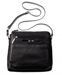 Professional and stylish, the sleek exterior of this handbag conceals multiple compartments and pockets for a clean-lined look and superior functionality. Professional and stylish, the sleek exterior of this handbag conceals multiple compartments and pockets for a clean-lined look and superior functionality.