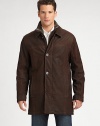 Impeccable stitching and attention to detail defines this luxurious walking coat shaped and structured in distressed Italian leather with removable shearling bib to ensure you'll remain warm and cozy all season long.Zip frontButtoned placketWaist slash pocketsFully linedAbout 34 from shoulder to hem LeatherDry cleanImported of Italian fabricFur origin: Portugal