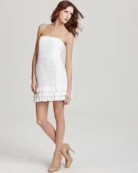 Lavished with lush lace, this short and sweet Lilly Pulitzer dress channels a distinctly feminine feel in a strapless silhouette with a flirty tiered ruffled hem. Lavished with lush lace, this short and sweet Lilly Pulitzer dress channels a distinctly feminine feel in a strapless silhouette with a flirty tiered ruffled hem.