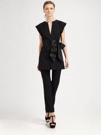 Wool-blend staple in a kimono silhouette with front flap pockets and a waist-cinching self tie. V-neckKimono cap sleevesSelf tie at waistFront flap pocketsAbout 29 from shoulder to hemFully lined50% viscose/49% wool/1% spandexDry cleanImportedModel shown is 5'10 (177cm) wearing US size Small. Wool-blend staple in a kimono silhouette with front flap pockets and a waist-cinching self tie. V-neckKimono cap sleevesSelf tie at waistFront flap pocketsAbout 29 from shoulder to hemFully lined50% viscose/49% wool/1% spandexDry cleanImportedModel shown is 5'10 (177cm) wearing US size Small.