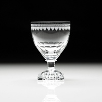 The original Flavia was made in England in about 1790 and has what is called a lemon squeezer foot. These were not made after about 1850 and this shape is much sought after by collectors. The intricate design around the rim is completely hand engraved, wtih each cut individually applied with an engraving wheel. It takes many hours of highly skilled work to complete one glass. The original Flavia was made in England in about 1790 and has what is called a lemon squeezer foot. These were not made after about 1850 and this shape is much sought after by collectors. The intricate design around the rim is completely hand engraved, wtih each cut individually applied with an engraving wheel. It takes many hours of highly skilled work to complete one glass.