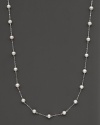 Beaded 14 Kt. white gold necklace with fresh water pearl stations.