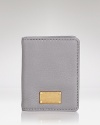 Key in and covet this MARC BY MARC JACOBS card case, coolly crafted of leather with understated details.