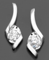 These beautiful Sirena diamond earrings embody sweeping elegance with round-cut diamonds (1/2 ct. t.w.) set in 14k white gold.  Approximate drop: 1/2 inch.
