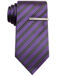 In a clean, classic stripe, this tie from Alfani adds a bright note to any dark suit. In a clean, classic stripe, this tie from Alfani adds a bright note to any dark suit.