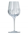 Equal parts modern splendor and classic beauty, the Equinox grande wine glass from Reed & Barton enhances formal tables with impeccable crystal shine. A round bowl encircled with deep faceted cuts reflects light from the sun, chandelier or candles on a slender, simply elegant stem.