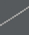 A geometric masterpiece, this vintage-inspired tennis bracelet is crafted from 18k gold over sterling silver with just the right amount of diamond accents. Approximate length: 7 inches.