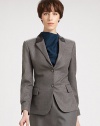 The perfect blazer, rendered in finespun wool flannel and finished with cuffed sleeves and a contrast collar.Contrast back collar panelNotched lapelsButton frontFlap pocketsLong sleeves with button cuffsSelf beltBack ventAbout 27 from shoulder to hem97% wool/3% elastaneDry cleanMade in FranceModel shown is 5'10 (177cm) wearing US size 4. 