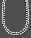 Traditional elegance combines with a modern, layered look. This two row strand of cultured freshwater pearls (3-4 mm and 8-9 mm) by Belle de Mer makes the perfect gift for the classic, stylish woman. Clasp crafted in sterling silver. Approximate length: 17 inches and 18 inches.