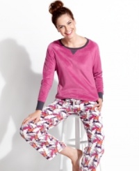 Snuggle up in these super soft microfleece pajamas by Cuddl Duds. The Ivory top features contrasting detail at the neckline and cuffs, while the roomy pants feature an elastic drawstring waist and fun all-over print. Snuggle up in these super soft microfleece pajamas by Cuddl Duds. The Ivory top features contrasting detail at the neckline and cuffs, while the roomy pants feature an elastic drawstring waist and fun all-over print.