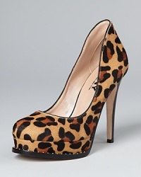 Wildly stylish, you'll be reaching for these DKNY platform pumps work and play. Soles accented with studs set these apart from the rest of the leopard looks. Wildly stylish, you'll be reaching for these DKNY platform pumps work and play. Soles accented with studs set these apart from the rest of the leopard looks.