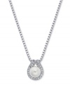 Top-notch style adds the perfect polish. Eliot Danori's elegant pendant combines shimmering silmulated pearls (8 mm) and sparkling crystals for optimum shine. Set in rhodium-plated mixed metal. Approximate length 16 inches + 2-inch extender. Approximate drop: 3/4 inch.
