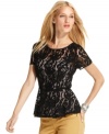 The silhouette of the season -- the peplum -- goes wildly chic when rendered in delicate lace! INC's top also features stylish button closures up the back.
