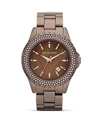 Opt for statement style with this espresso-tone watch from MICHAEL Michael Kors, featuring three hand movement and a glitzy, crystal encrusted dial. Opt for statement style with this espresso-tone watch from MICHAEL Michael Kors, featuring three hand movement and a glitzy, crystal encrusted dial.