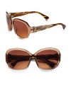 THE LOOKRounded style Translucent plastic framesLogo etched lens T logo temples Tonal striped armsLogo ear tips Signature case includedTHE COLORBrown with brown gradient lensesORIGINMade in Italy