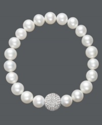A traditional design receives a sparkling touch. Cultured freshwater pearls (8-9 mm) in shimmery white hues adorn this chic stretch bracelet, while a clear crystal fireball adds extra glamour. Approximate diameter: 3-1/2 inches.