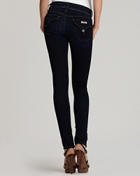 Every wardrobe deserves a pair of super chic skinnies. This ultra flattering pair from Hudson comes in a versatile deep indigo wash you can dress up or down. Every wardrobe deserves a pair of super chic skinnies. This ultra flattering pair from Hudson comes in a versatile deep indigo wash you can dress up or down.