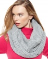 A chic neck wrap they say keeps the winter chill at bay, like with this plush design from Calvin Klein that features a soft, shimmery knit fabric that's instantly eye-catching.