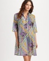 A vibrant geo-tribal print makes this trapeze dress a must-have. Mandarin collarElbow-length sleevesButton placketPull-on style70% cotton/30% silkDry cleanMade in Italy