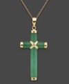 A peaceful cross pendant in calming jade and 14k gold. Approximate length: 18 inches. Approximate drop: 1-1/2 inches.