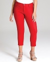 A fiery hue ignites these Karen Kane Plus denim leggings, fashioned in a cropped silhouette for a trend-right style.