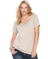 What a stud: metallic embellishments add an edgy air to a softly draped plus size top from INC.