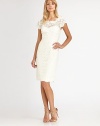 Romantic lace in a flattering shift style, finished with a prettily rendered illusion neckline.ScoopneckCap sleevesIllusion sweetheart necklineBack cutout detailConcealed back zipFully linedAbout 23 from natural waistNylon/rayonDry cleanImported of domestic fabricModel shown is 5'11 (180cm) wearing US size 4. 