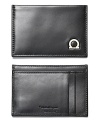 Carry your business card and those important to you in this supple leather card holder from Salvatore Ferragamo. With two slots on back, and metal Gancini logo on front.
