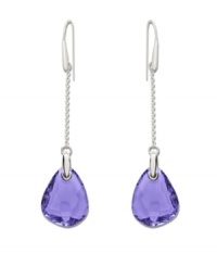 Pretty in purple: Striking tanzanite-colored stones adorn Swarovski's linear drop crystal earrings. They're an eye-catching element to enhance any outfit. Crafted in silver tone mixed metal. Approximate drop: 3-1/8 inches. Pretty in purple: Striking tanzanite-colored stones adorn Swarovski's linear drop crystal earrings. They're an eye-catching element to enhance any outfit. Crafted in silver tone mixed metal. Approximate drop: 3-1/8 inches.