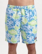 A bright mix of tropical flowers and seashells lends seagoing style to an easy-fitting swim favorite. Elastic waist with internal drawstring Side slash, back patch pockets Mesh lining Inseam, about 7 Polyester Machine wash Imported 