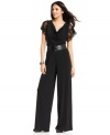 AGB's jumpsuit was made with parties in mind--the sheer lace sleeves and cowl neckline make a luxe statement!