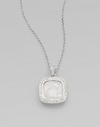 A center, faceted doublet surrounded by dazzling stones on a sleek link chain. Rhodium plated brassCrystalsCubic zirconiaCeramicLength, about 16 to 18 adjustablePendant size, about ½Lobster closureImported 
