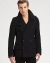 A sleek interpretation of a traditional gentleman's essential, this modern, trim-fitting Italian wool coat features handsome military-inspired epaulets, vertical zip pockets at the front and leather trim at the cuffs.Button-frontShoulder epaulettesZippered chest, waist flap pocketsAbout 27 from shoulder to hemWoolDry cleanMade in Italy