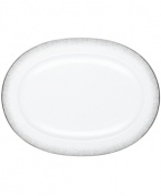 A fine mist of platinum dots settles along the sumptuous white china of this Alana Platinum oval platter, bringing elegant allure to every memory-making occasion. From Noritake.