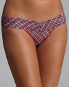 Hanky Panky updates its low-rise, lace thong with a punchy plaid print. Style #8U1586.