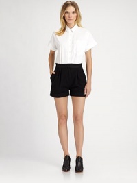 This clever, strategically tailored one-piece style lends the illusion of perfectly paired separates.Point collarButton frontPatch pocketShort cuffed sleevesSide slash pocketsFront pleatsCuffed legBack welt pockets About 32 from shoulder to hemCottonDry cleanMade in ItalyModel shown is 5'10½ (179cm) wearing US size 4. This clever, strategically tailored one-piece style lends the illusion of perfectly paired separates.Point collarButton frontPatch pocketShort cuffed sleevesSide slash pocketsFront pleatsCuffed legBack welt pockets About 32 from shoulder to hemCottonDry cleanMade in ItalyModel shown is 5'10½ (179cm) wearing US size 4.