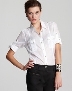 BASLER's laidback linen blouse is a vacation essential. Pair with denim for classic style.