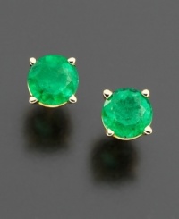 Burst onto the scene with eye-catching green. Stud earrings feature vibrant, round-cut emeralds (1 ct. t.w.) in a 14k gold post setting. Approximate diameter: 5 mm. Burst onto the scene with eye-catching green. Stud earrings feature vibrant, round-cut emeralds (1 ct. t.w.) in a 14k gold post setting. Approximate diameter: 5 mm.