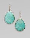 Double layer teardrops combine softly hued turquoise with rutilated quartz, creating a distinctive depth and unique surface, in a setting of polished gold.TurquoiseRutilated quartz18k yellow goldLength, about 1½Ear wireImported