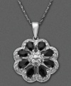 Accent your outfit with a joyful flower. Pendant features onyx (5/3 mm) and diamond accents set in sterling silver. Approximate length: 18 inches. Approximate drop: 1 inch.