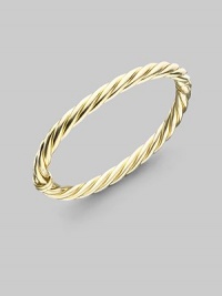 From the New Cable Collection. An elegant classic with a signature twist, in gleaming 18k gold. 18k yellow gold Cable, 6mm Diameter, about 2½ Made in USA