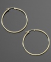 These delicate hoop earrings are the perfect compliment to your dressed-up style or everyday look. Crafted in 14k gold. Approximate diameter: 3/8 inch.