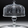 This is a practical and wonderfully decorative covered cake stand and dome. Perfect for displaying the finest gateaux. Exquisitely hand engraved, it is the fanciest piece of fine crystal.