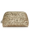 Every girl needs a little glamour, and this shimmery sequin-embellished cosmetic case from Nine West is just the right touch. Stashes all your makeup essentials and easily slips into a purse or overnight bag for on-the-go touchups anywhere.