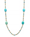 Splash yourself with vibrant ocean colors. Breezy necklace from the Lauren by Ralph Lauren collection features a delicate, long chain decorated with various turquoise-colored glass beads. Crafted in gold tone mixed metal. Approximate length: 36 inches.