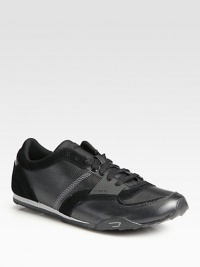 A flawless design, this casual lace-up sneaker constructed from a sublime blend of leather and suede exudes city cool, without sacrificing the comfort and ease you would except from a padded insole and a durable rubber sole.Leather/suede upperPadded insoleRubber soleImported A flawless design, this casual lace-up sneaker constructed from a sublime blend of leather and suede exudes city cool, without sacrificing the comfort and ease you would except from a padded insole and a durable rubber sole.Leather/suede upperPadded insoleRubber soleImported